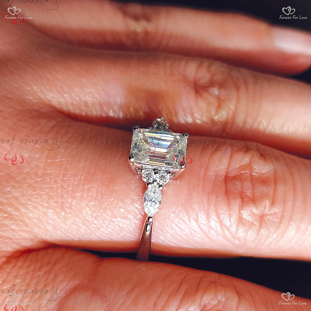 Emerald Cut Diamond Trilogy Engagement Ring with Marquise Side Diamonds