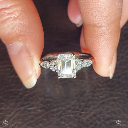 Emerald Cut Diamond Trilogy Engagement Ring with Marquise Side Diamonds