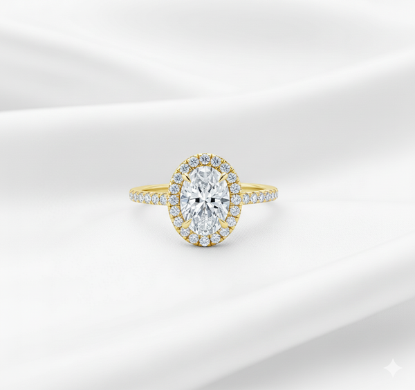 Oval lab diamond halo engagement ring with pave band in yellow gold