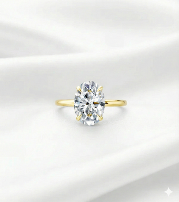 Oval lab diamond solitaire engagement ring in yellow gold with prong setting