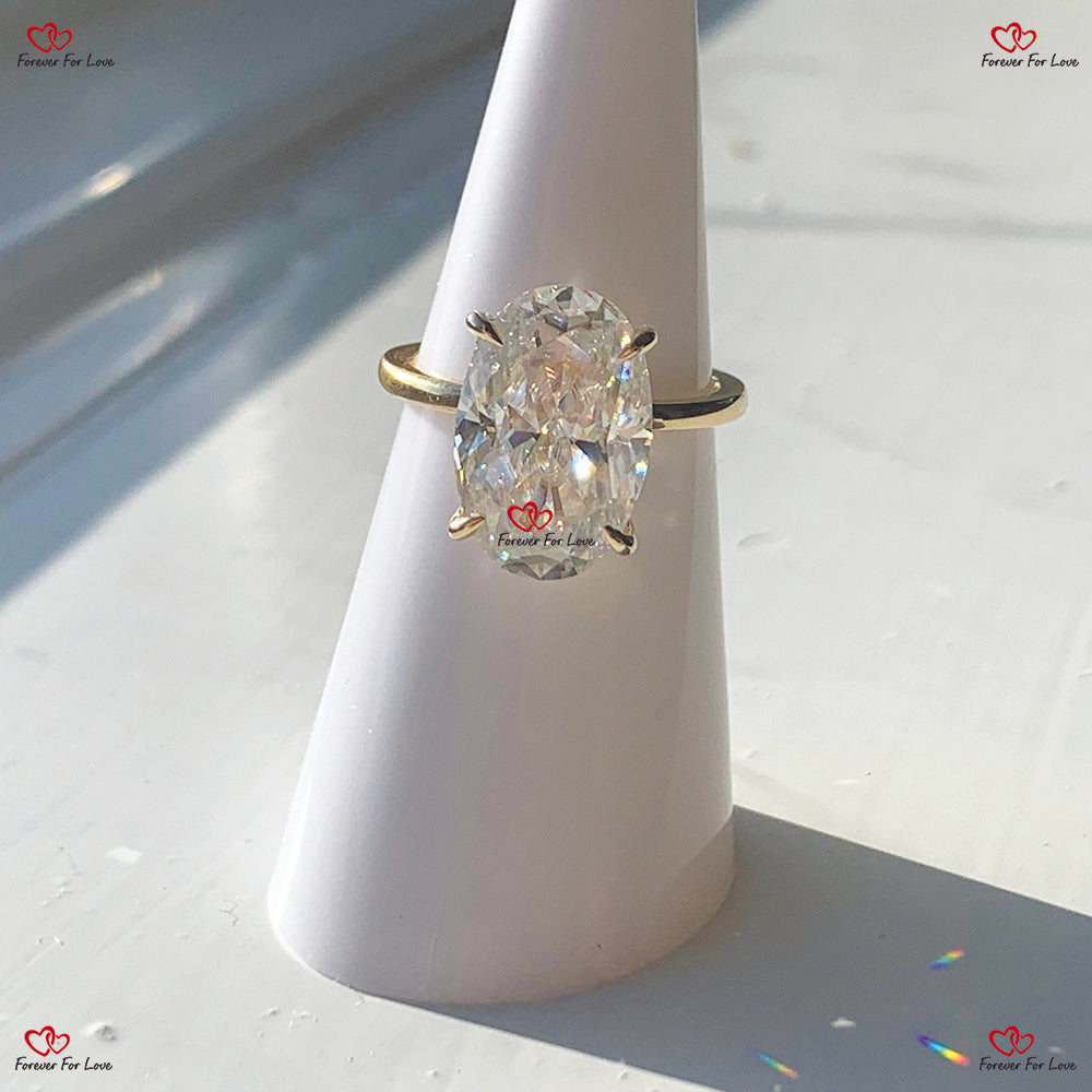 Bague de fiançailles en moissanite à taille ovale avec halo de diamants