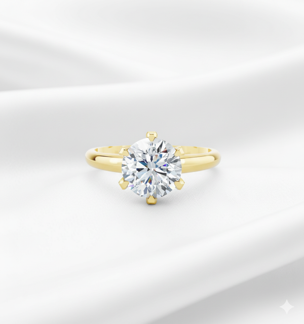 Round lab diamond solitaire engagement ring in yellow gold with six prong setting