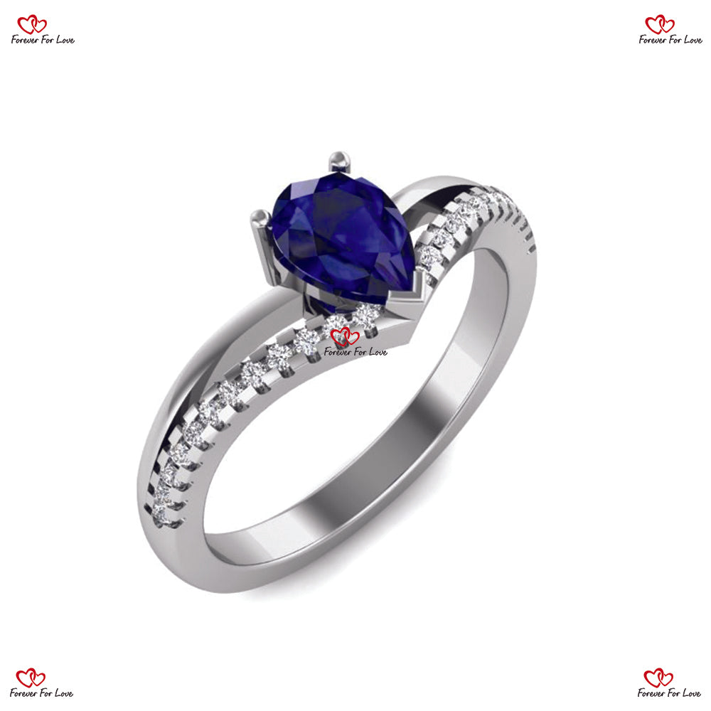 Bague de fiançailles en or blanc avec saphir bleu royal naturel de Ceylan et diamant taille poire